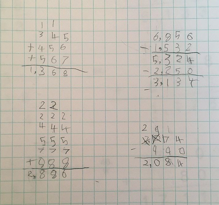Large addition problems written in pencil on grid-lined graph paper.