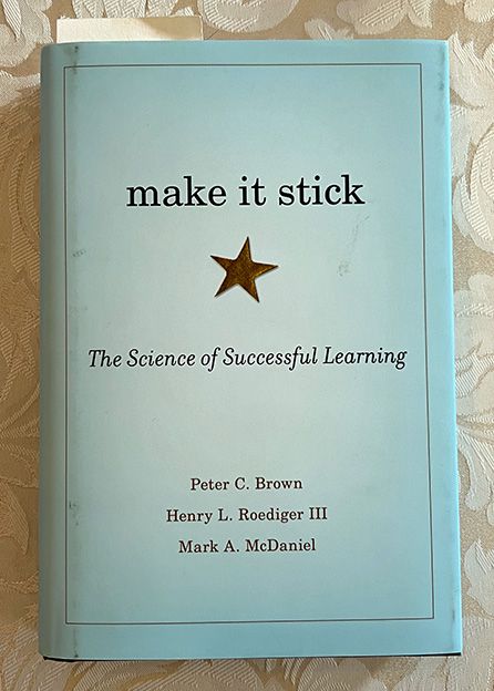 Cover of the book "Make It Stick," with a simple gold star sticker on a pale blue background.