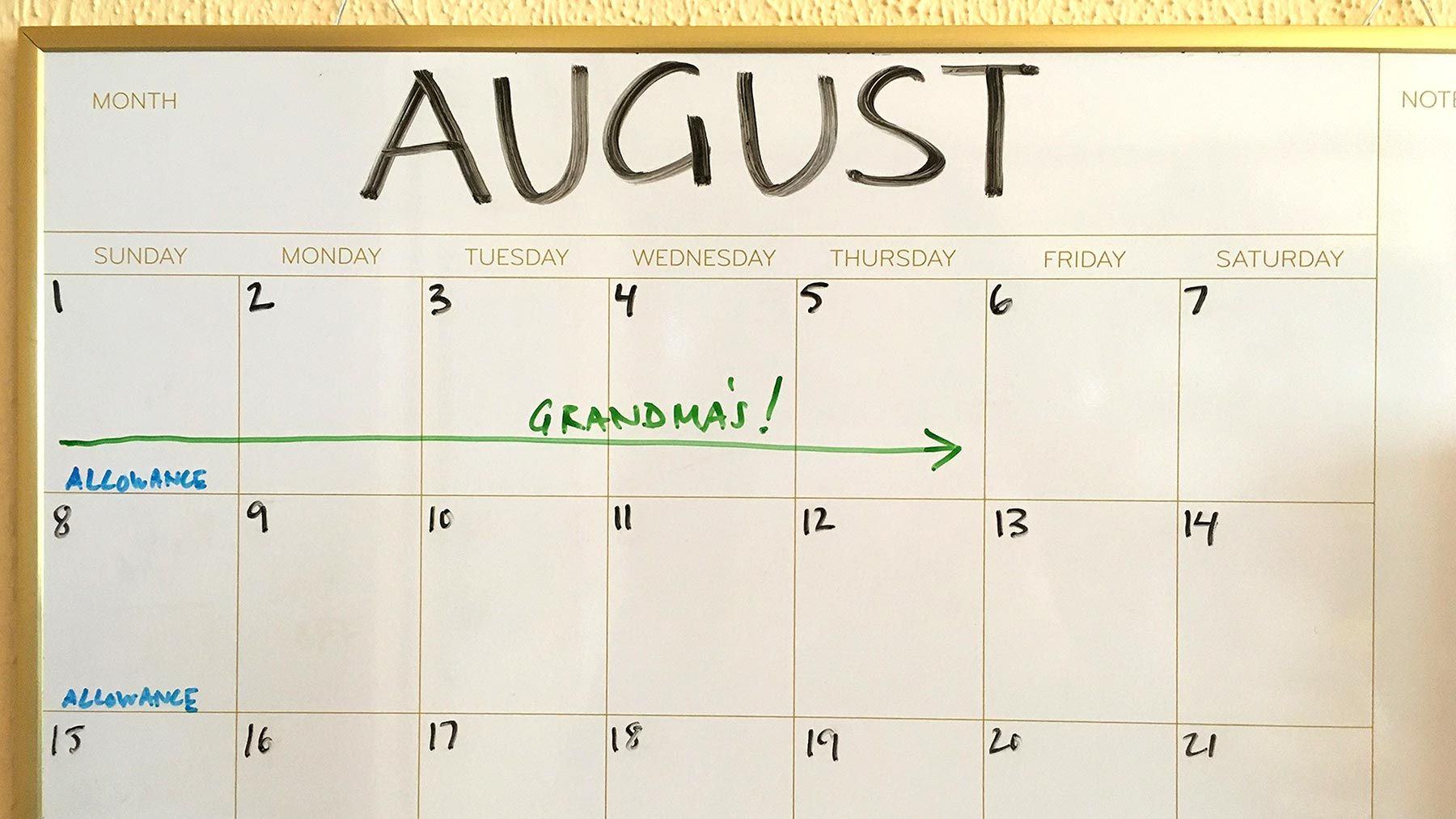 Wall calendar for August, with the 1st through 5th marked as a trip to Grandma's