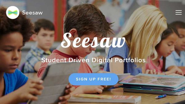 The Seesaw logo, superimposed on a scene of kids in a classroom.